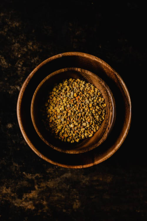 bee pollen in wooden bowl