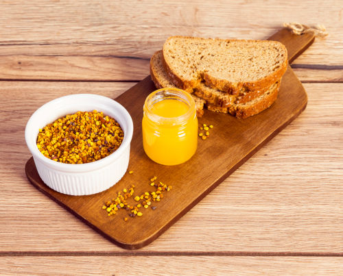 bee pollen with bread and orange juice