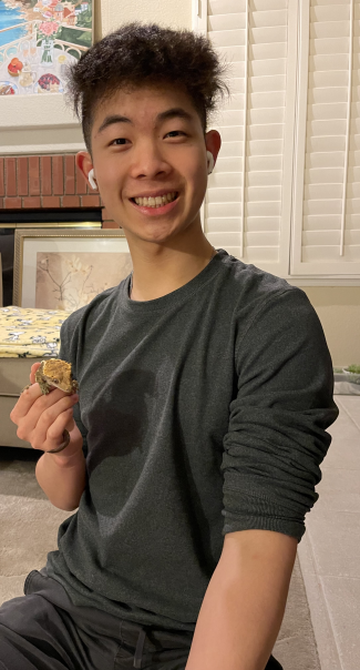 Michael Chu holding his crested gecko